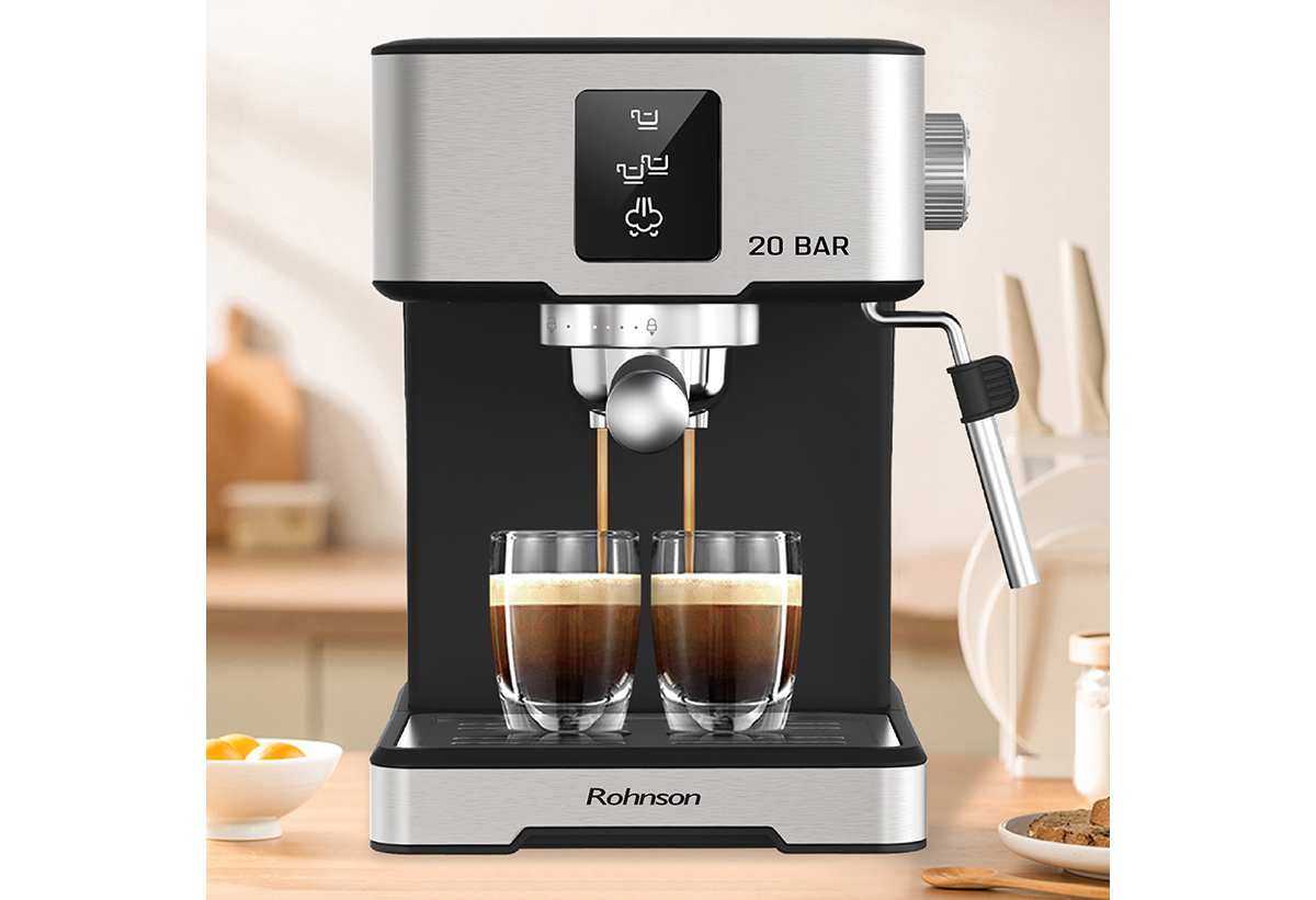 Απεικονίζεται η μηχανή πάνω σε τραπέζι κουζίνας.